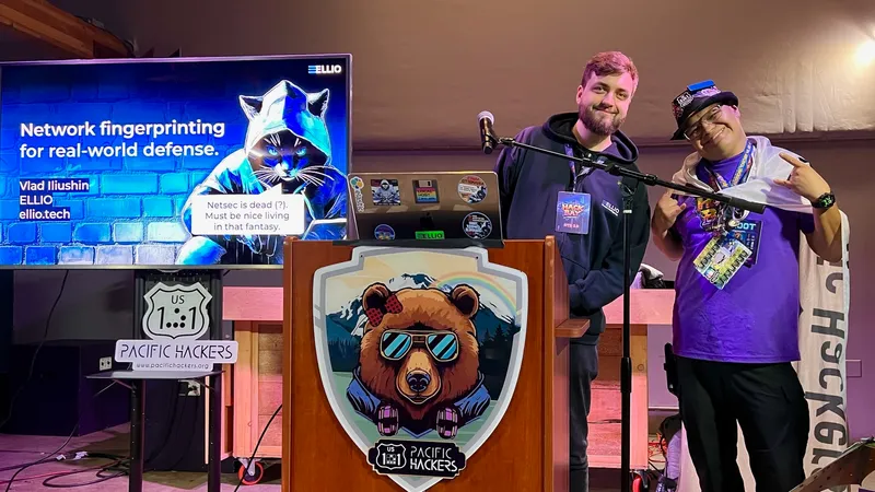 Marco Palacios from Pacific Hackers Association and Vlad Iliushin from ELLIO on the stage at HackTheBay 2025 in San Francisco